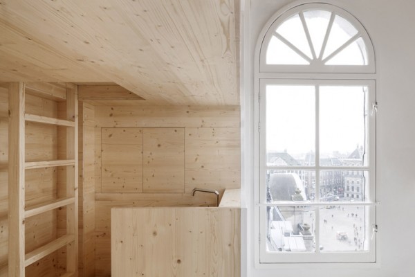 Многоуровневая квартира-студия из дерева